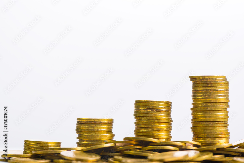 Increasing columns of coins, piles of gold coins arranged as a graph on white background Increasing columns of coins, piles of gold coins arranged as a graph on white background