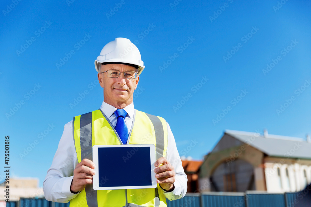 Engineer builder at construction site