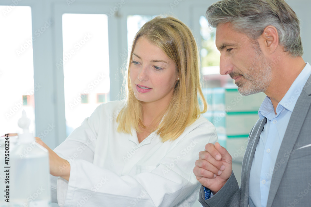 Fototapeta premium Man with woman in white jacket