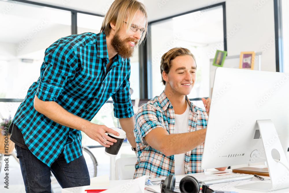 Fototapeta premium Two office workers at the desk