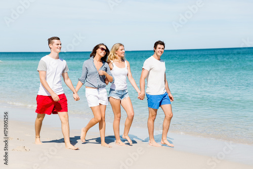 Company of young people on the beach