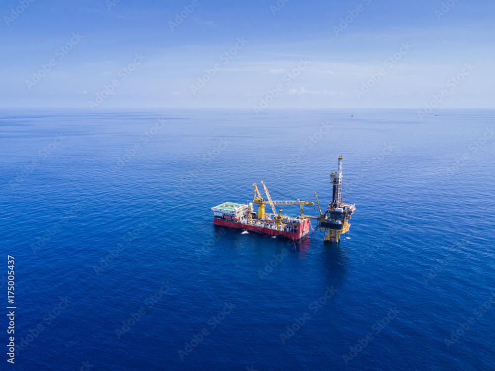 Aerial View of Tender Drilling Oil Rig (Barge Oil Rig) in The Middle of The Ocean