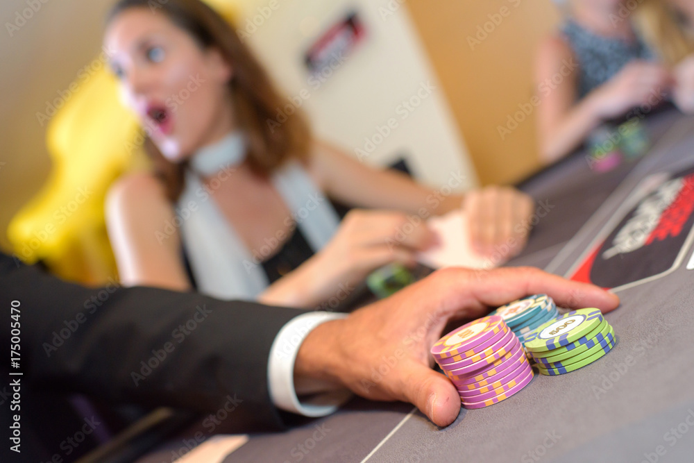 winner player playing poker a casino