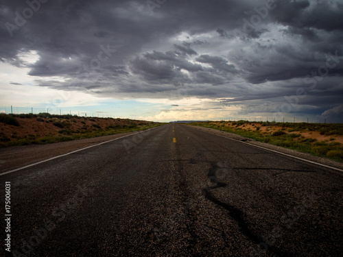 Desert Road with Storm Clouds