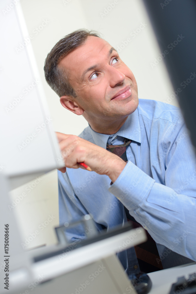 Fototapeta premium Closeup of smiling office worker