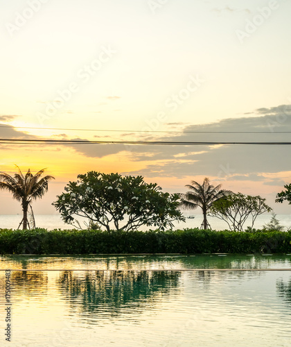 Twilight sunrise sky at sea with pool