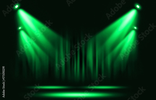 Stage lights. Green spotlight with certain through the darkness.