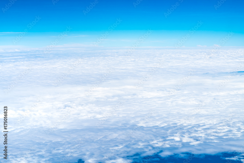 Blue sky and Cloud Top view from airplane window,Nature background.