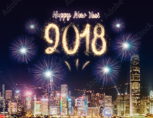 Happy new year 2018 firework over cityscape building near sea at night time celebration,Happy new year countdown.