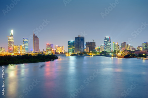 Wallpaper Mural Night view of Business and Administrative Center of Ho Chi Minh city on Saigon riverbank in twilight, Vietnam.
 Torontodigital.ca