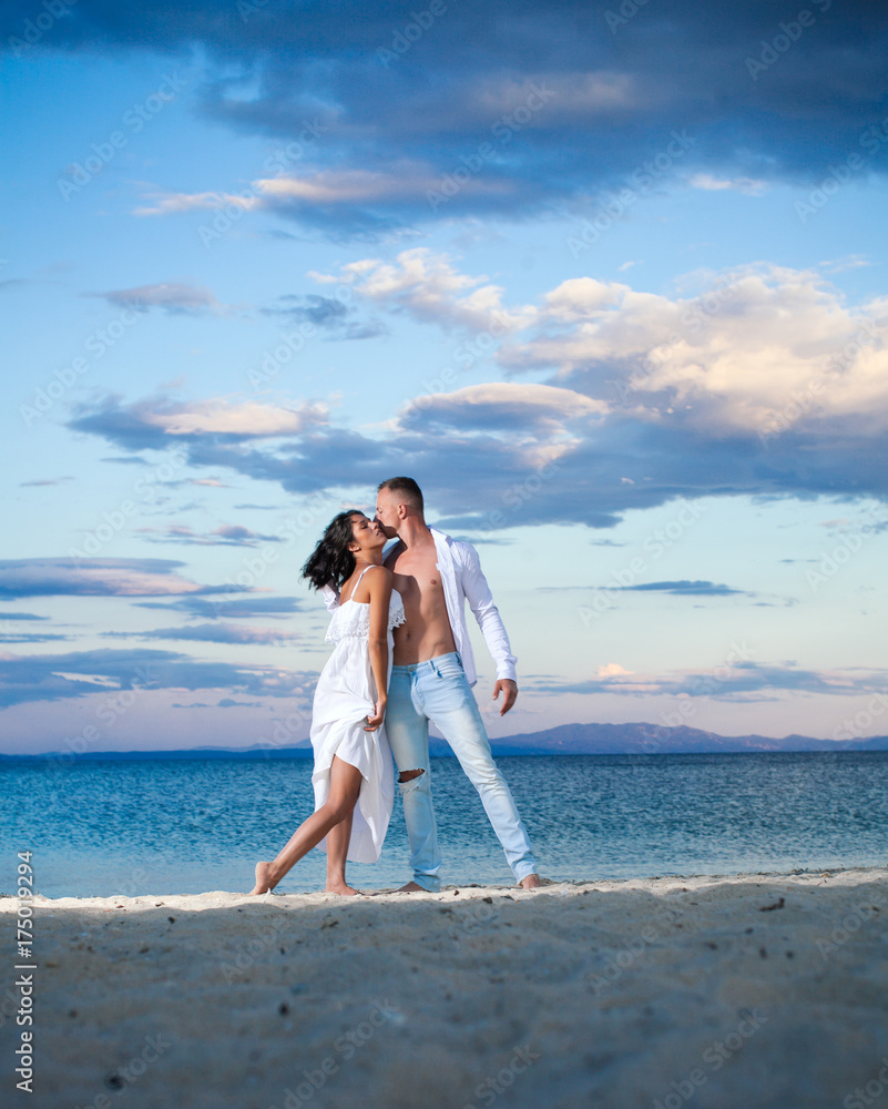 Passionate couple kissing, boy and girl. Having sex. Young lovers. People in love. Sensual