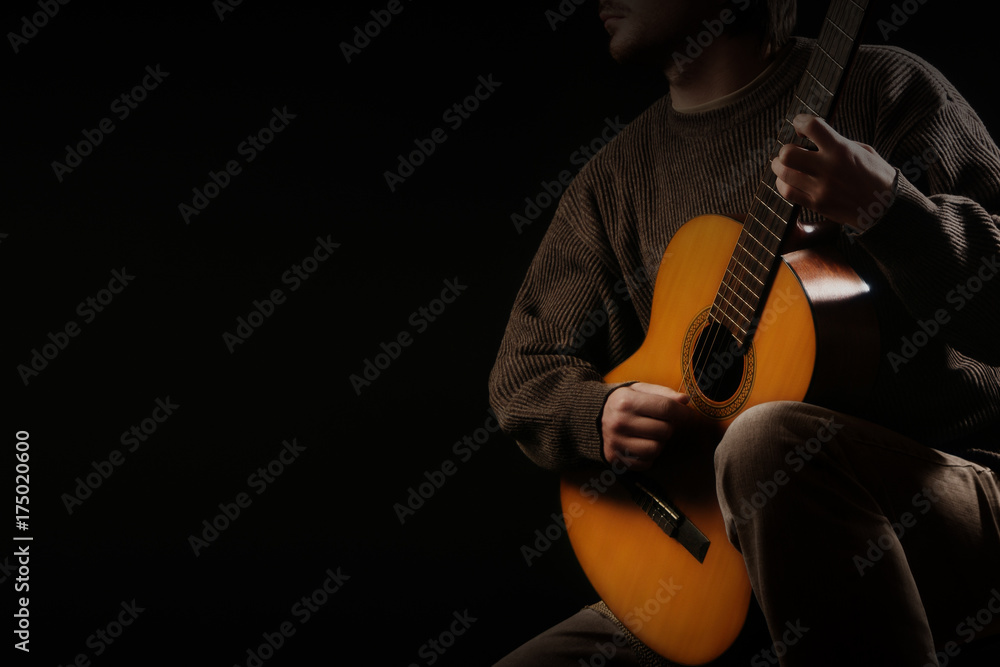 Naklejka premium Classical guitar player. Classic guitarist playing acoustic guitar