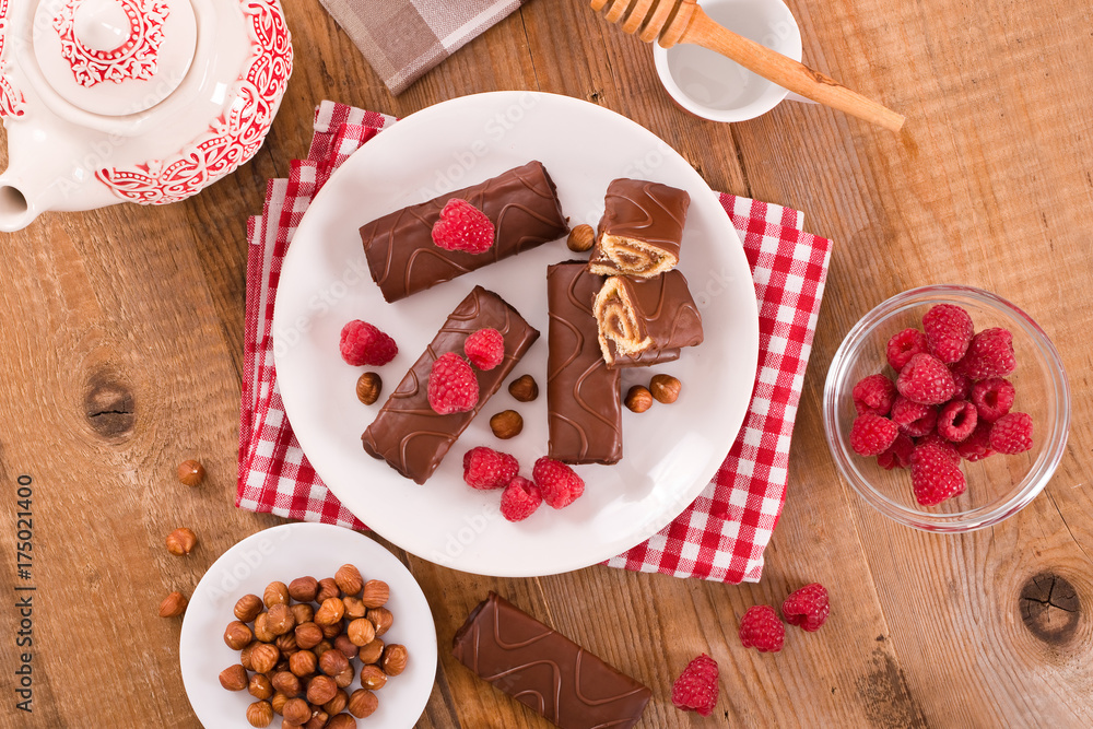 Chocolate rolls with hazelnuts and raspberries. Chocolate rolls with hazelnuts and raspberries.