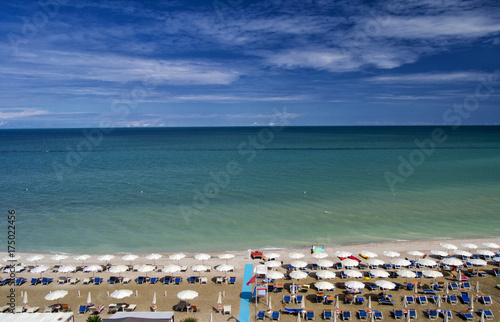 aerial view of parasols and beachline in Marotta. For travel and holiday concepts © giodilo
