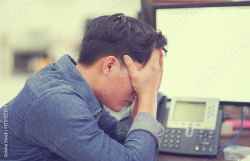 close up asian man hand gesture palm up over face and head, stress employee concept.