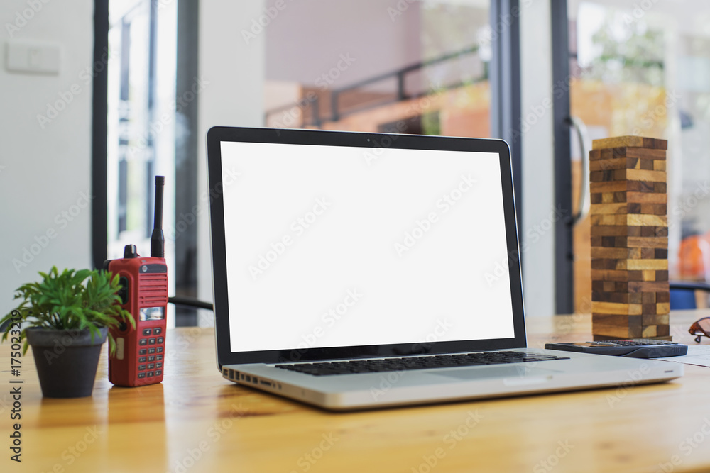 Fototapeta premium Conceptual workspace, Laptop with blank screen on table