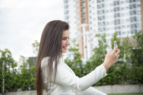 Women video calling on her smart phone