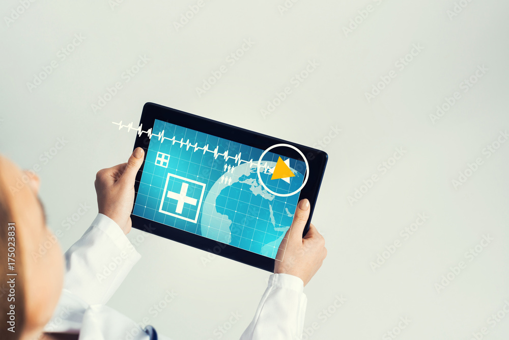 Close of female doctor hands working with tablet pc computer Close of female doctor hands working with tablet pc computer