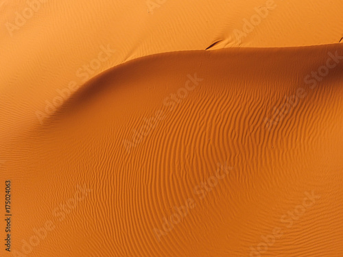 aerial view of red desert sand dunes