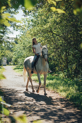 Girl and horse in the woods © keleny
