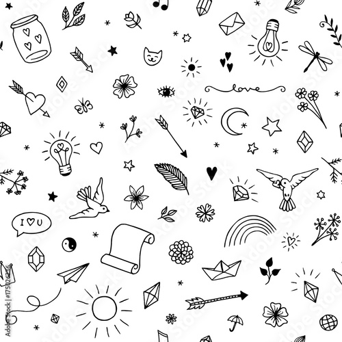 Seamless pattern with various hand drawn decorative and fun elements in black and white