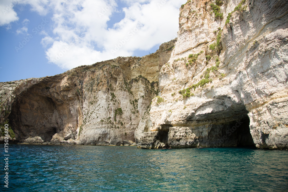 Blue Grotto, famous rock formations and caves attraction at Malta sea shore