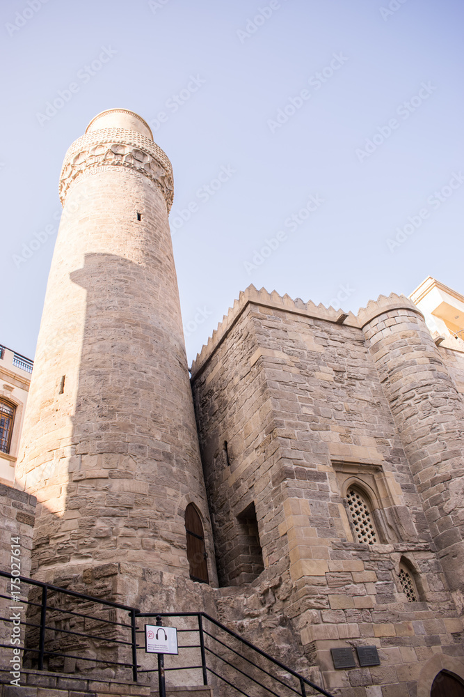 Minaret of Muhammad Mosque in Old city, Icheri Sheher is the historical core of Baku. Baku, Azerbaijan - September 20, 2017