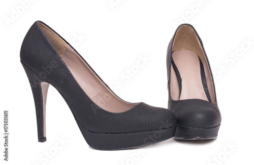 Pair of black elegant high heel female shoes isolated on white background.