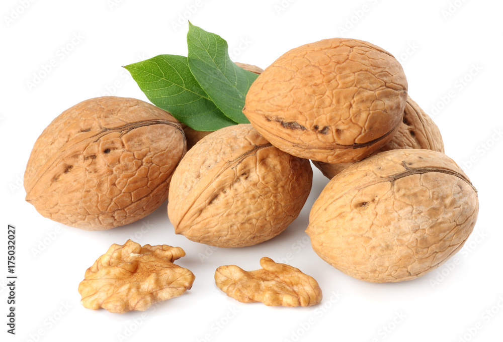 Walnuts with leaves isolated on white background Walnuts with leaves isolated on white background