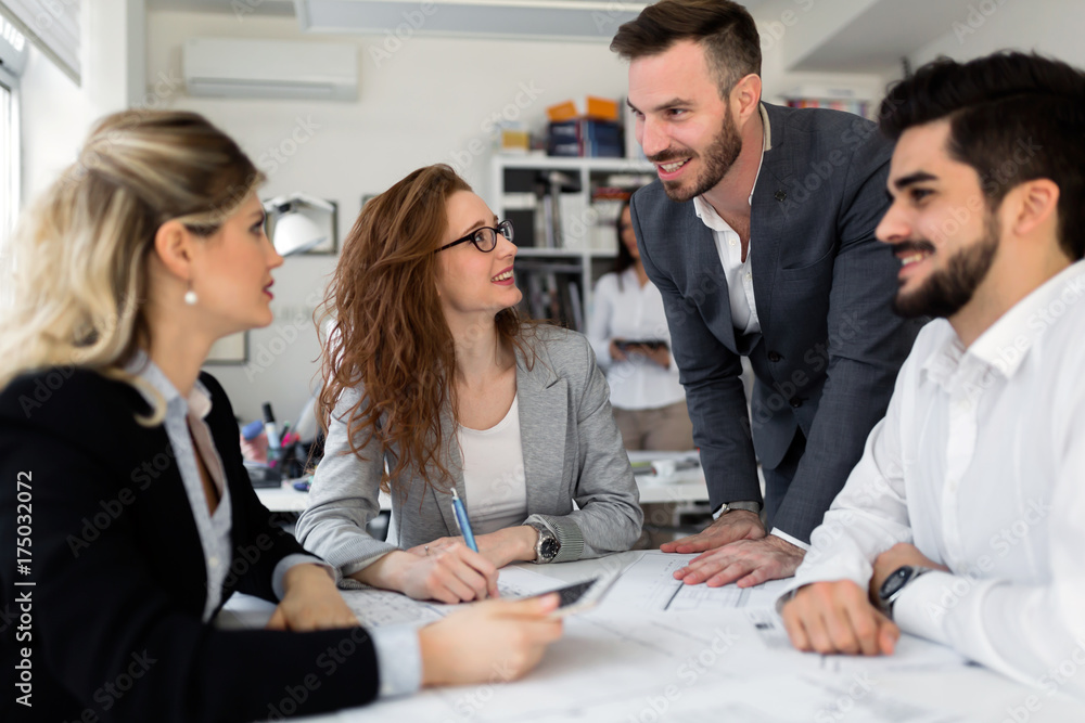 Group of architects working together on project Group of architects working together on project