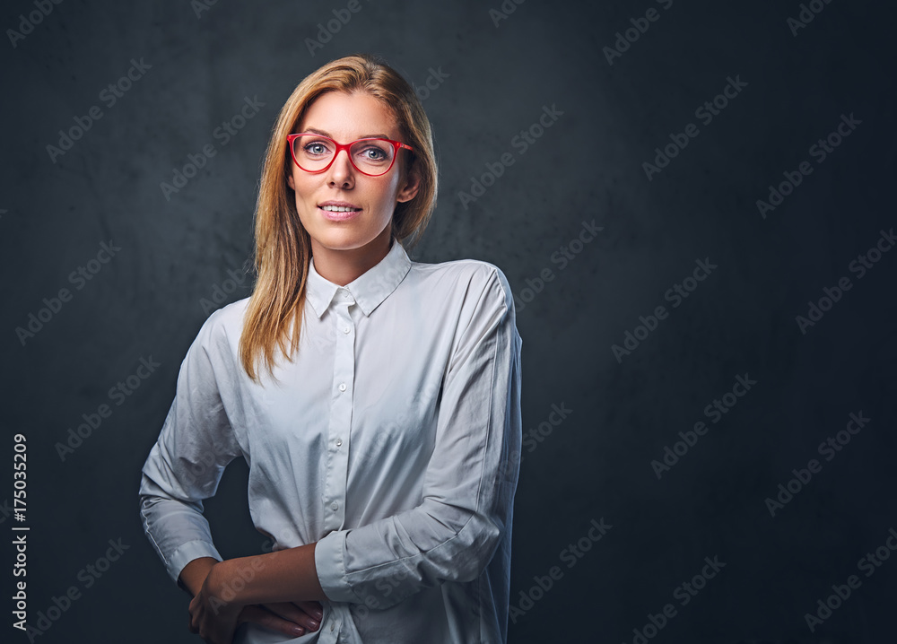 Attractive blond business woman in a white shirt.