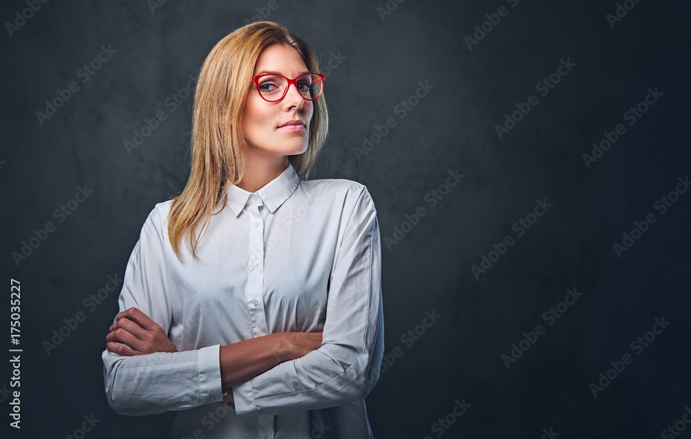 Attractive blond business woman in a white shirt. Attractive blond business woman in a white shirt.