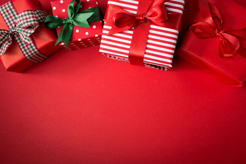 Red Christmas presents on red