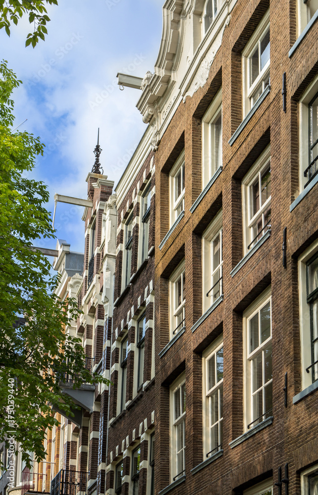 Fototapeta premium Traditional old buildings in Amsterdam