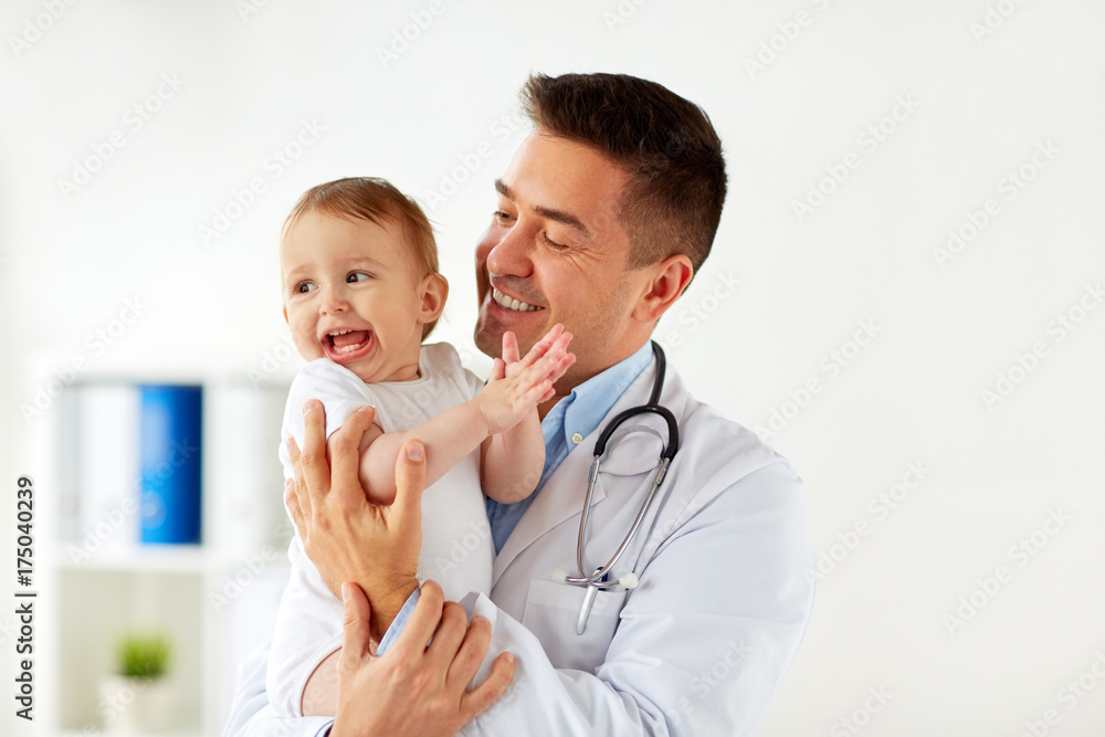 © Syda Productions - happy doctor or pediatrician with baby at clinic