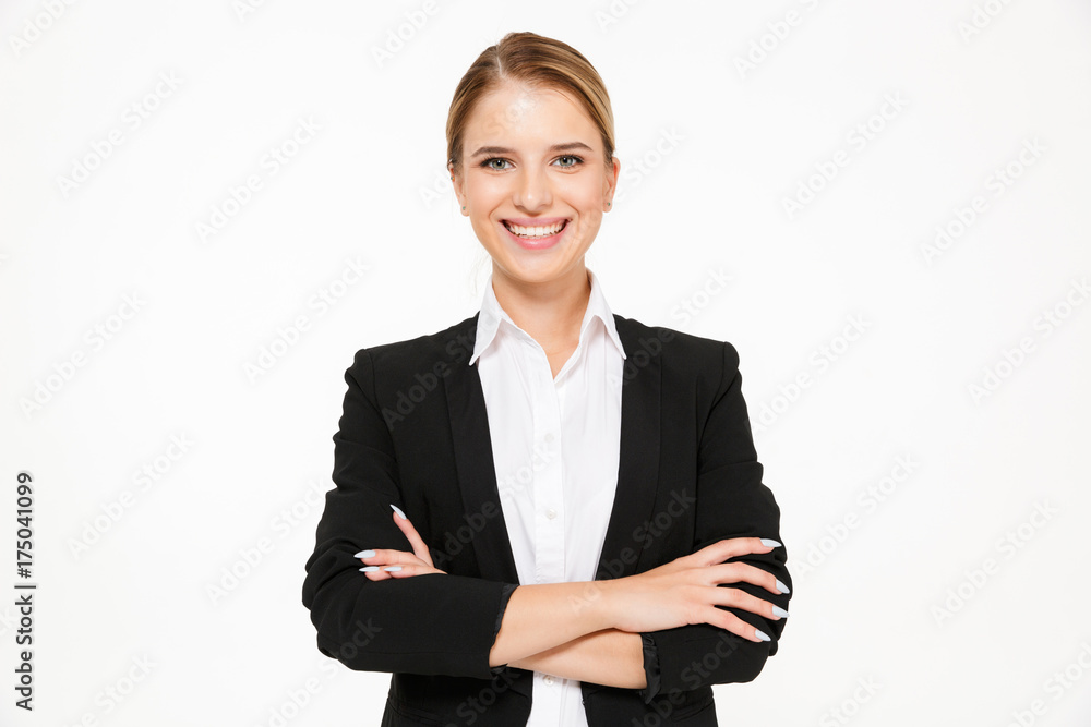 Smiling blonde business woman posing with crossed arms Smiling blonde business woman posing with crossed arms