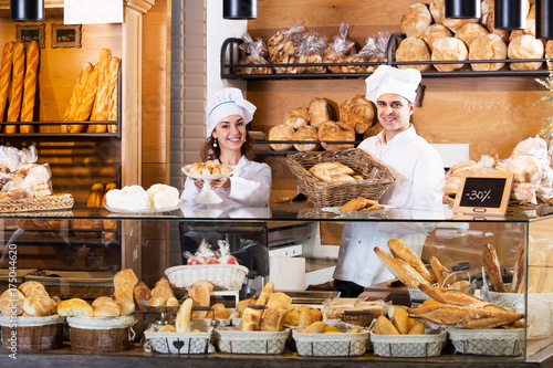 Wallpaper Mural Bakery staff offering bread and different pastry Torontodigital.ca
