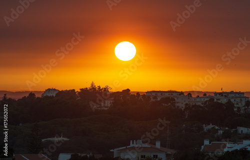 Beautiful sunset over the city of Portimao, Portugal.