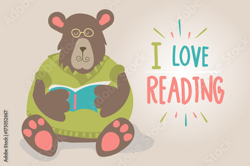 bear in a sweater reading a book. I love to read.