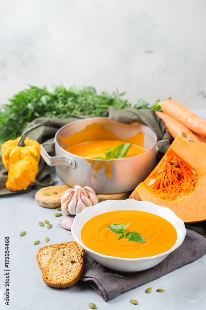 Fall autumn roasted orange pumpkin carrot soup with garlic Fall autumn roasted orange pumpkin carrot soup with garlic