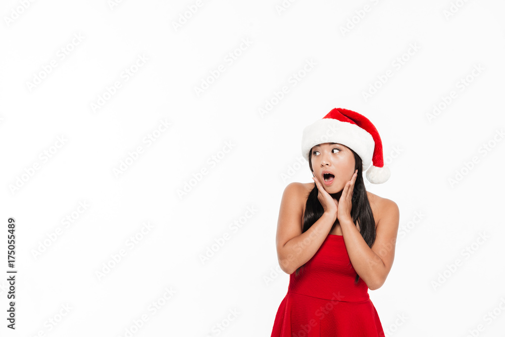 Portrait of a young asian woman in red christmas costume Portrait of a young asian woman in red christmas costume