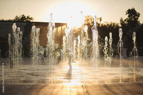 Принти на полотні Small fountain with water streams beating from below