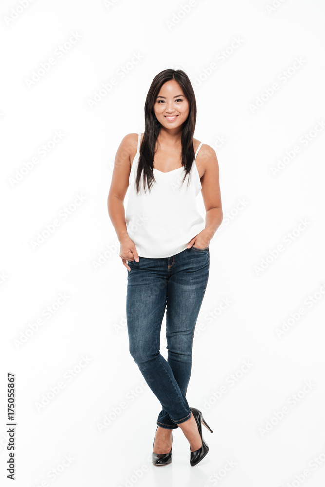 Full lemgth portrait of a casual smiling asian woman Full lemgth portrait of a casual smiling asian woman