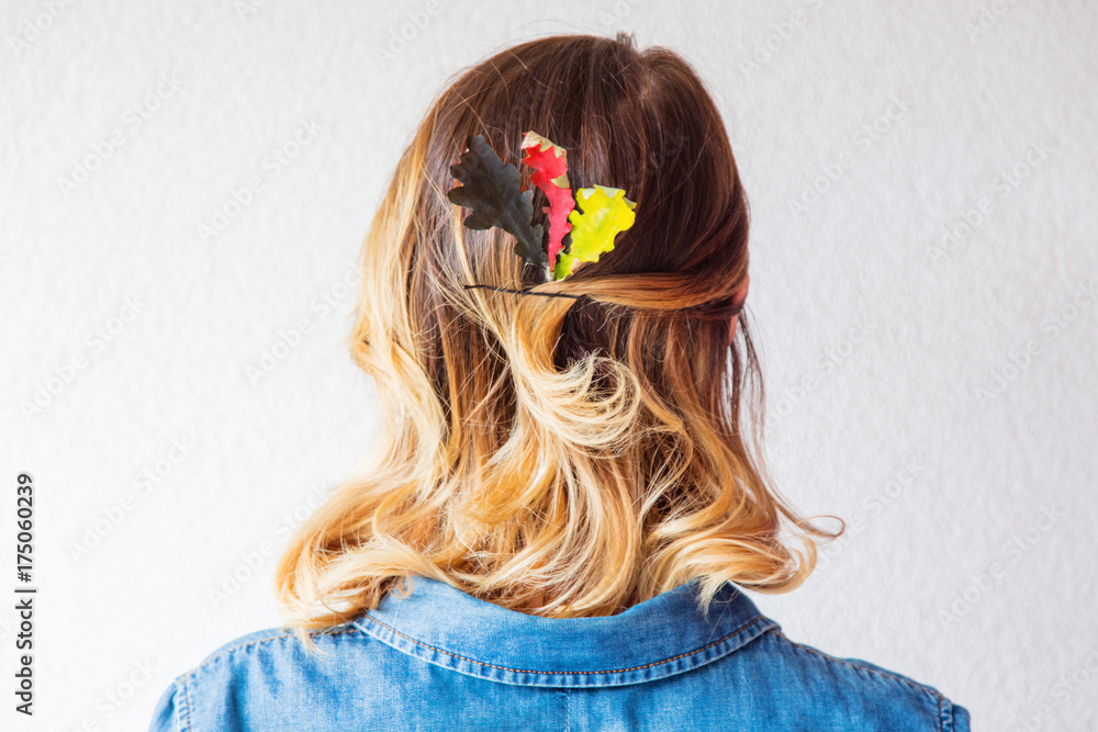 Naklejka premium Redhead girl with oak leaves at Germany Unity day