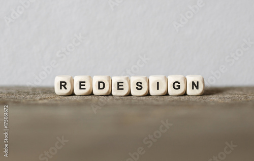 Word REDESIGN made with wood building blocks