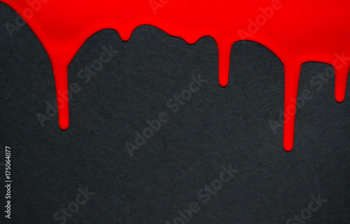 Blood running drops on black background. Dripping blood seamless repeatable. Background. Halloween. Flow liquid, drip wet.