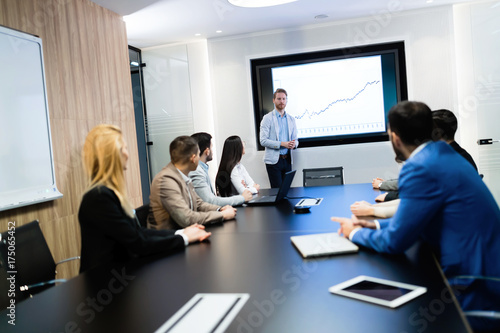 Picture of businesspeople having meeting in conference room