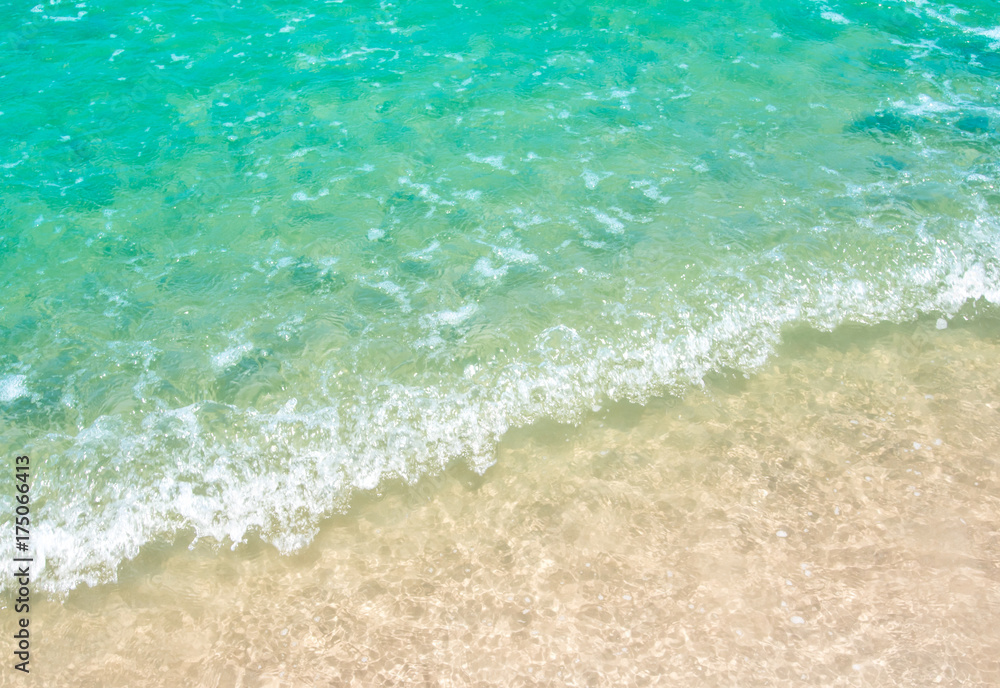 White bubble of Sea wave on the beach