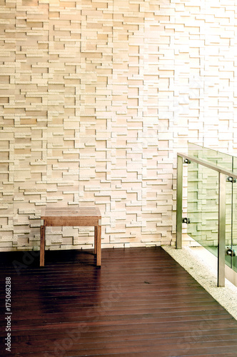 White brick wall and table on the wooden floor