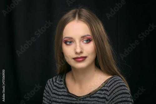 a large portrait of a beautiful white girl.